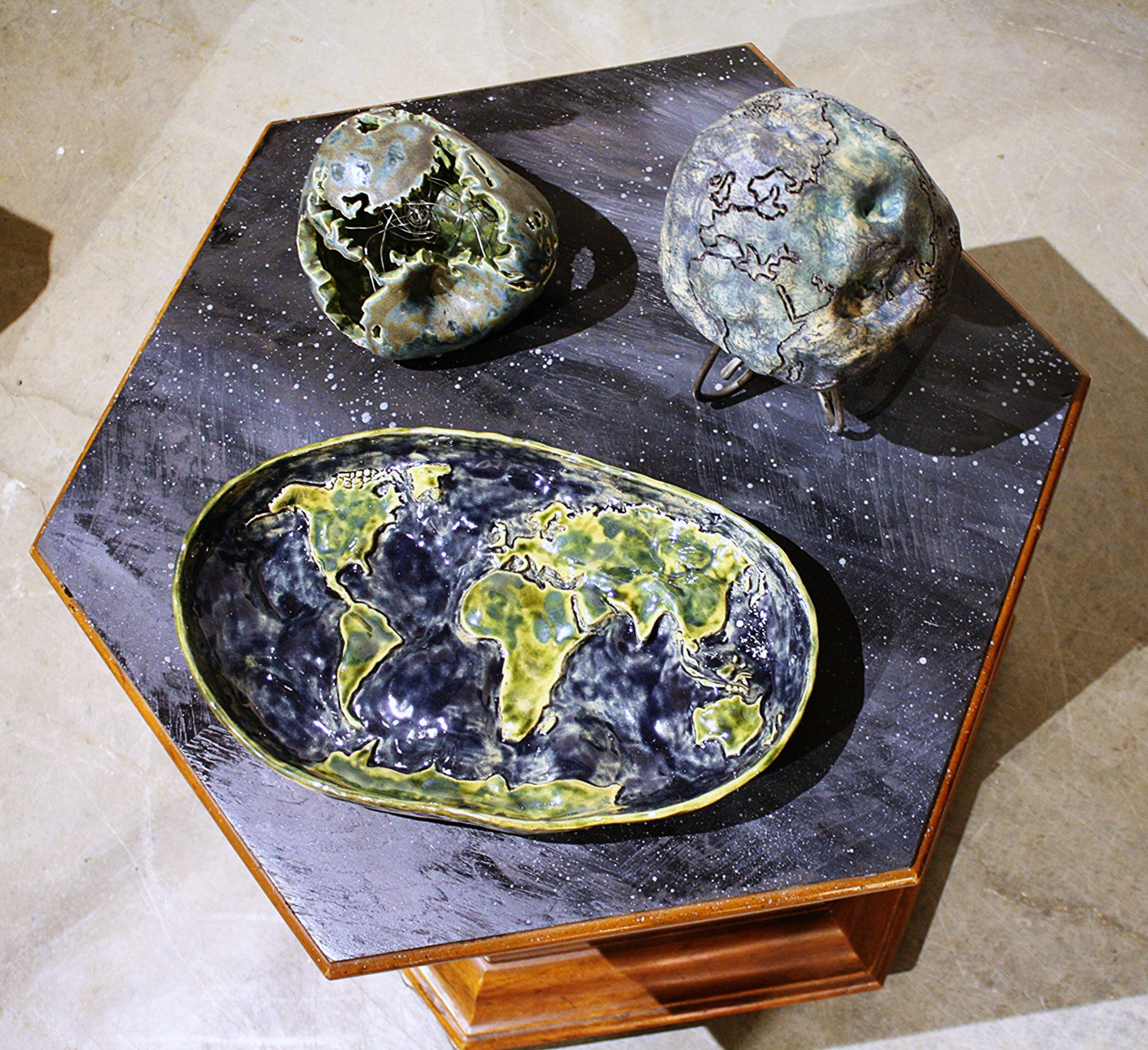 The Geoid Sculptures displayed for critique, second hand wooden stand refinished in grey and black space. 